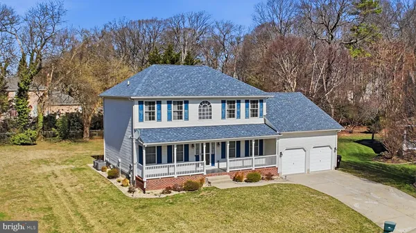 a view of a balcony with wooden floor
