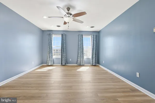 a bathroom with a toilet a sink and shower