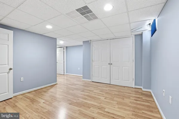 an aerial view of a house with outdoor space