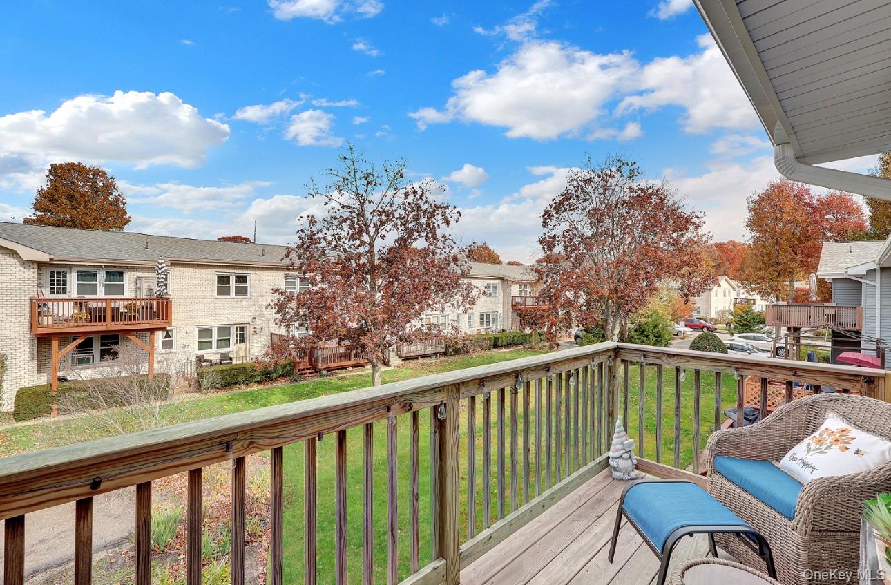 83 Finch Lane, Unit 2B Islip, NY 11751 - Photo 13 of 18 a view of a city from a balcony