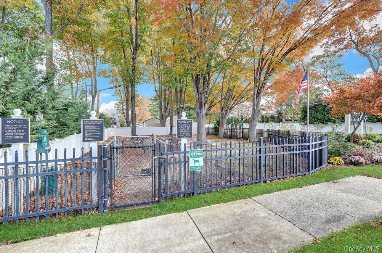 83 Finch Lane, Unit 2B Islip, NY 11751 - Photo 14 of 18 a view of a entrance gate of a house