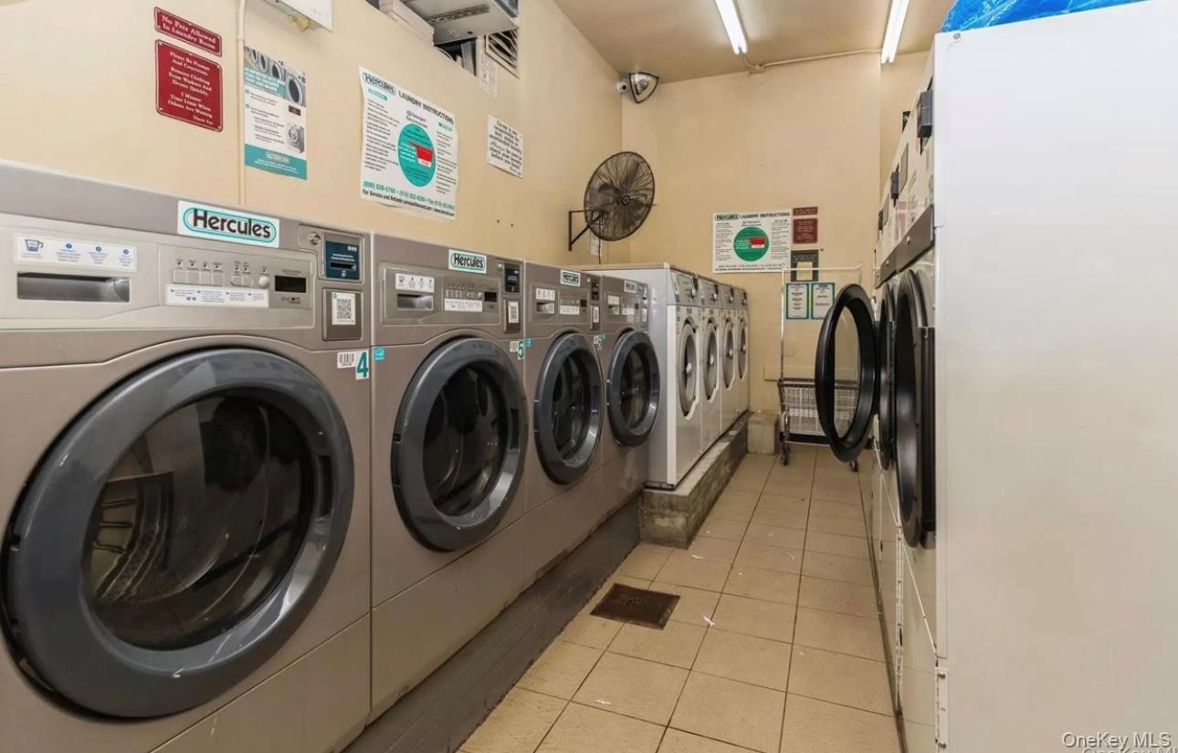 83 Finch Lane, Unit 2B Islip, NY 11751 - Photo 18 of 18 a utility room with dryer and washer