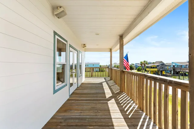 a view of a balcony and a hallway
