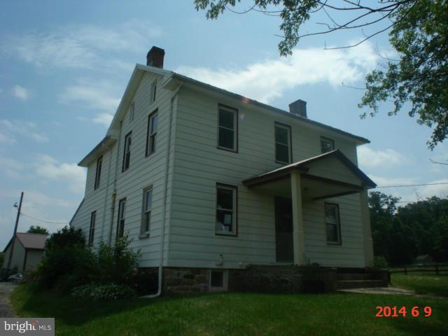 12301 Warner Road Keymar, MD 21757 - Photo 1 of 16 a front view of house along with green space