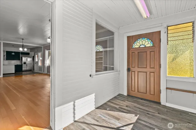a view of livingroom with furniture and window