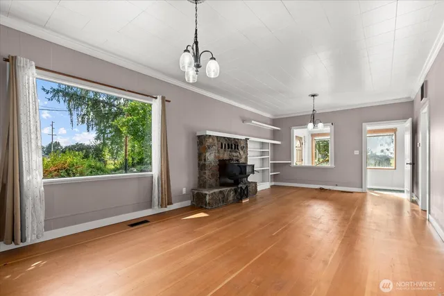 a view of livingroom with window swimming pool and outdoor space