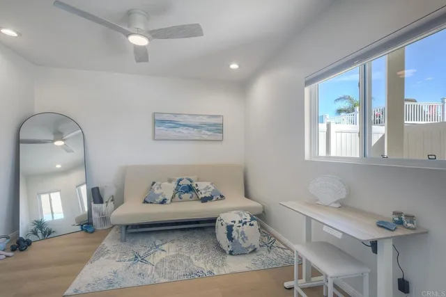 a view of a garden with an outdoor seating