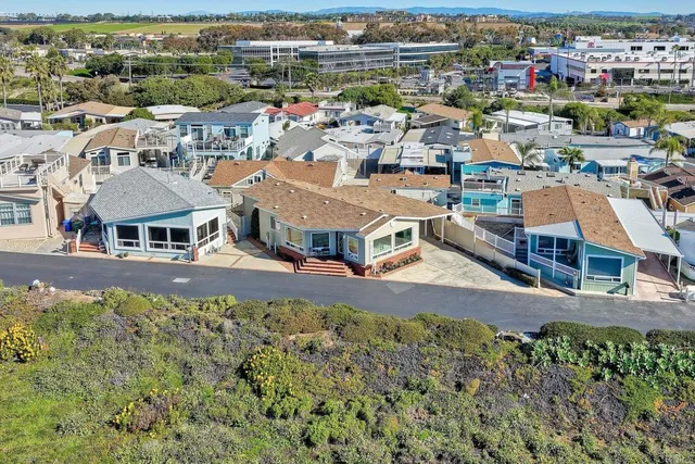 a view of a ocean with a mountain