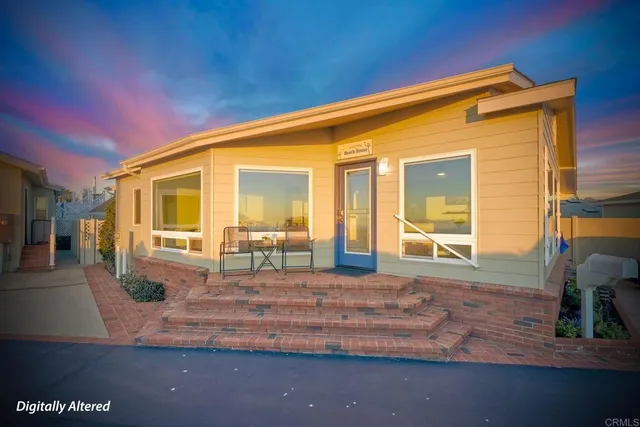 a view of roof deck with wooden floor and city view