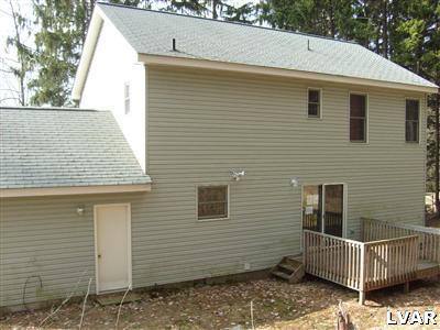 8164 Rinker Road Stroudsburg, PA 18360 - Photo 2 of 5 a view of house with deck