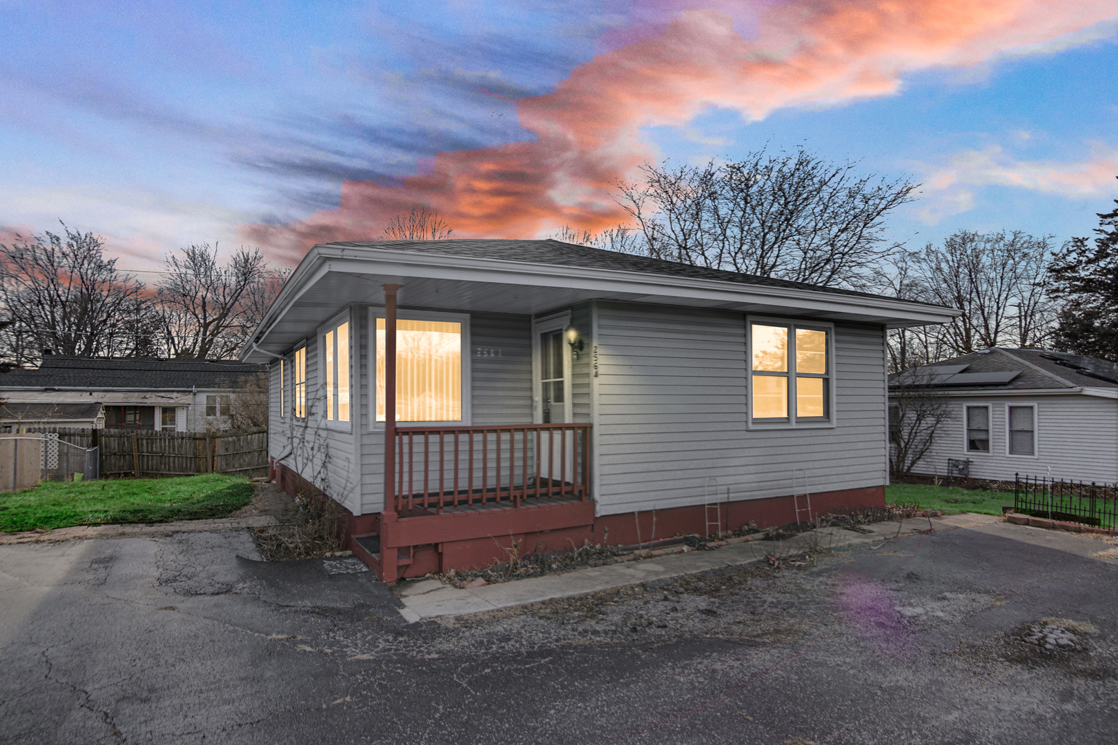 2564 Plainfield Road Joliet, IL 60435 - Photo 2 of 20 a front view of a house with a garden