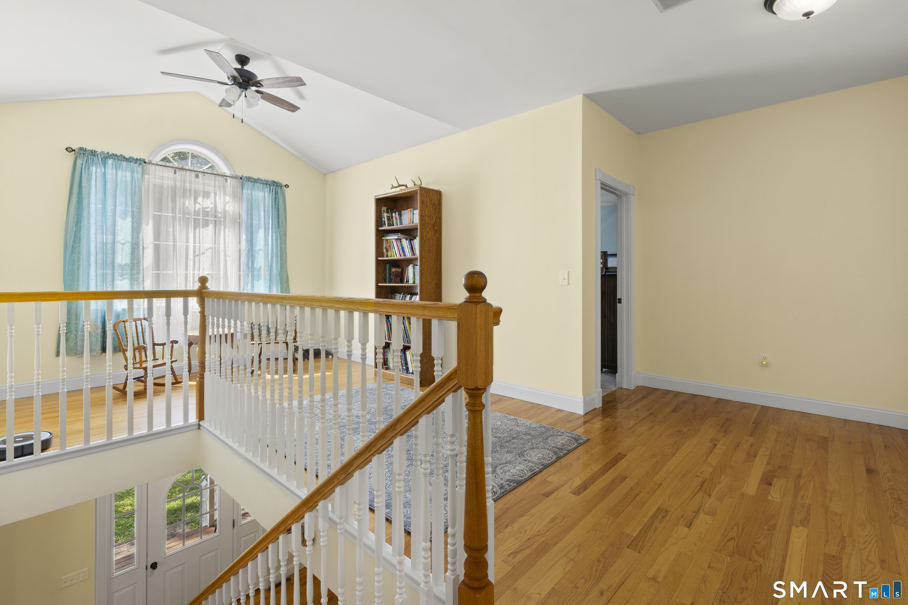 175 Cranberry Bog Road Killingly, CT 06239 - Photo 21 of 40 a view of a hallway with wooden floor and staircase