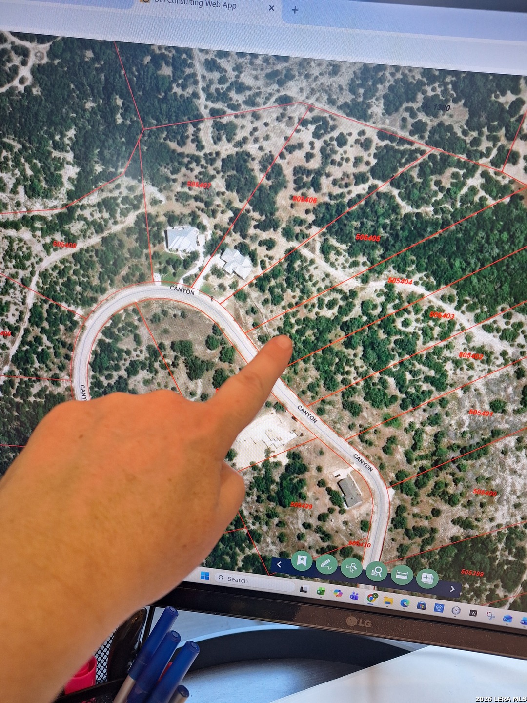 Lot 13 Canyon Rim Helotes, TX 78023 - Photo 2 of 5 an aerial view of a residential houses with outdoor space