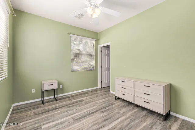 a view of a room with cabinet and a window