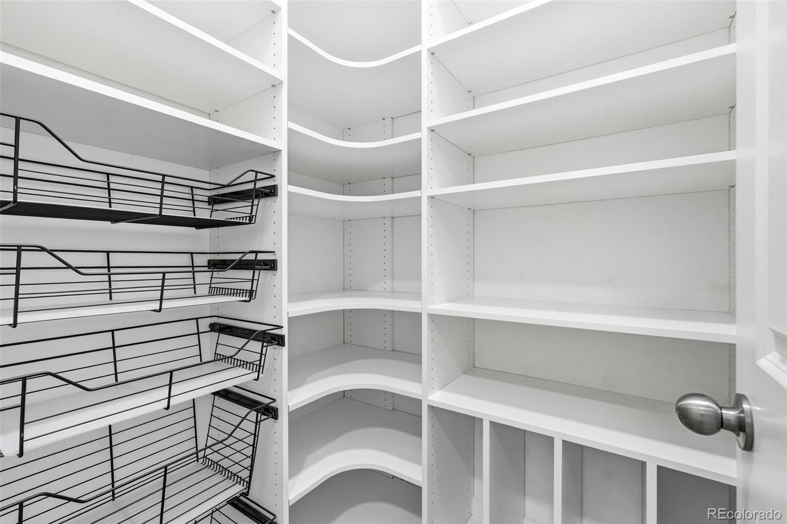 8283 South Queen Street Littleton, CO 80127 - Photo 21 of 46 a view of storage and utility room