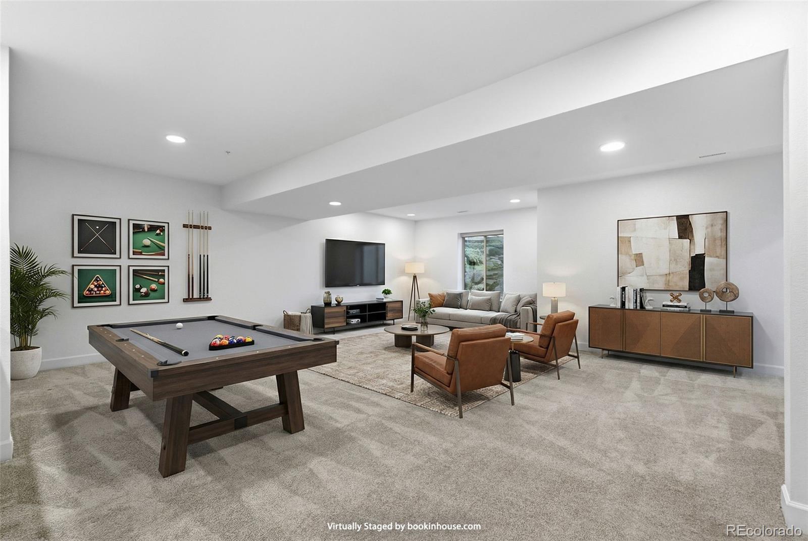 8283 South Queen Street Littleton, CO 80127 - Photo 30 of 46 a living room with furniture a flat screen tv and a window