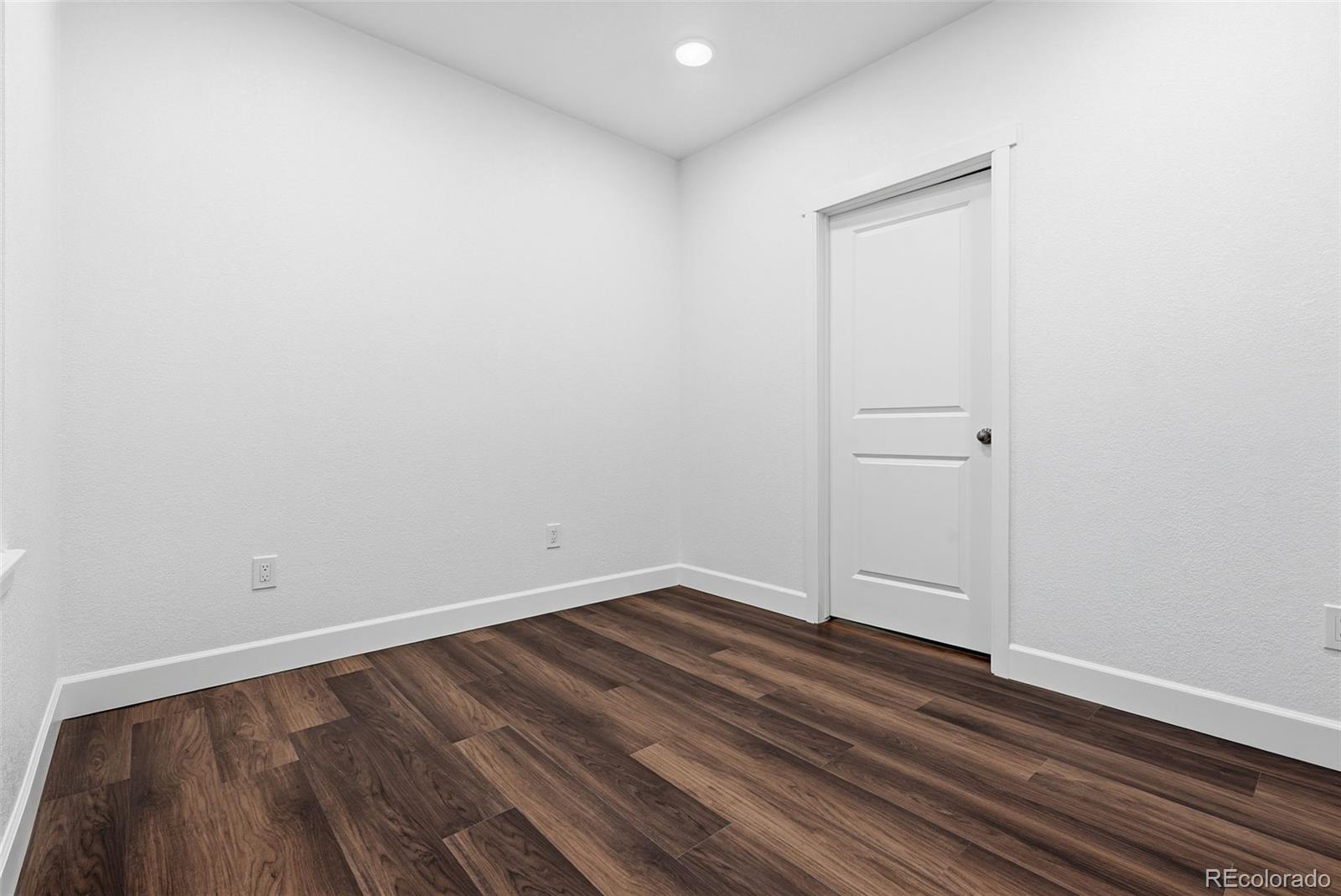 8283 South Queen Street Littleton, CO 80127 - Photo 36 of 46 wooden floor in a room