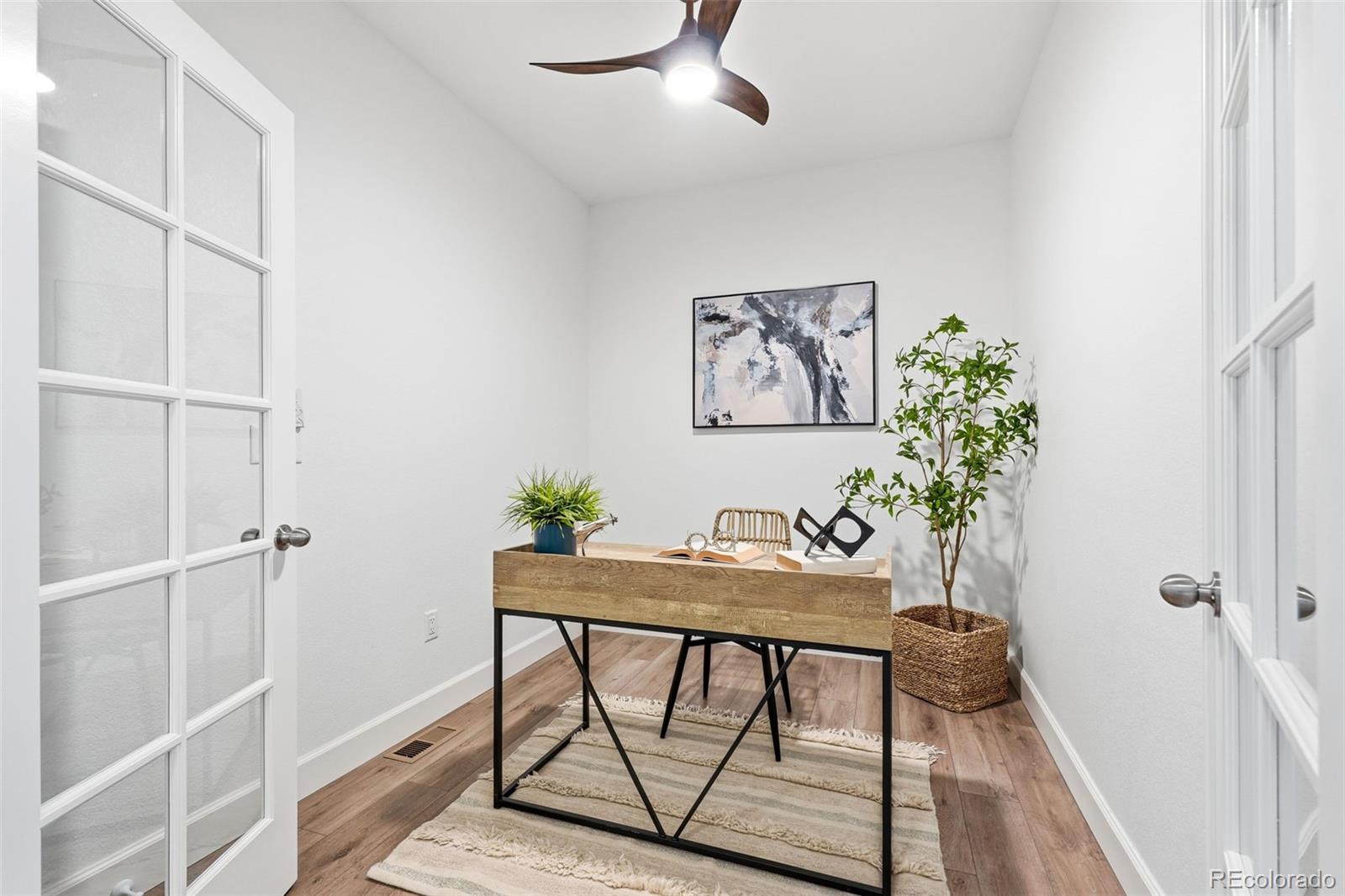 8283 South Queen Street Littleton, CO 80127 - Photo 8 of 46 a view of a workspace with furniture