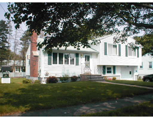 48 Miriam Road Waltham, MA 02451 - Photo 1 of 10 a front view of house with yard and green space