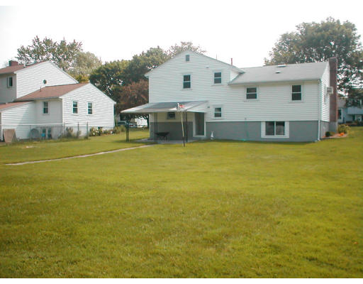 48 Miriam Road Waltham, MA 02451 - Photo 6 of 10 a front view of house with yard and trees