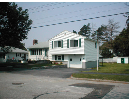 48 Miriam Road Waltham, MA 02451 - Photo 10 of 10 a front view of a house with a garden