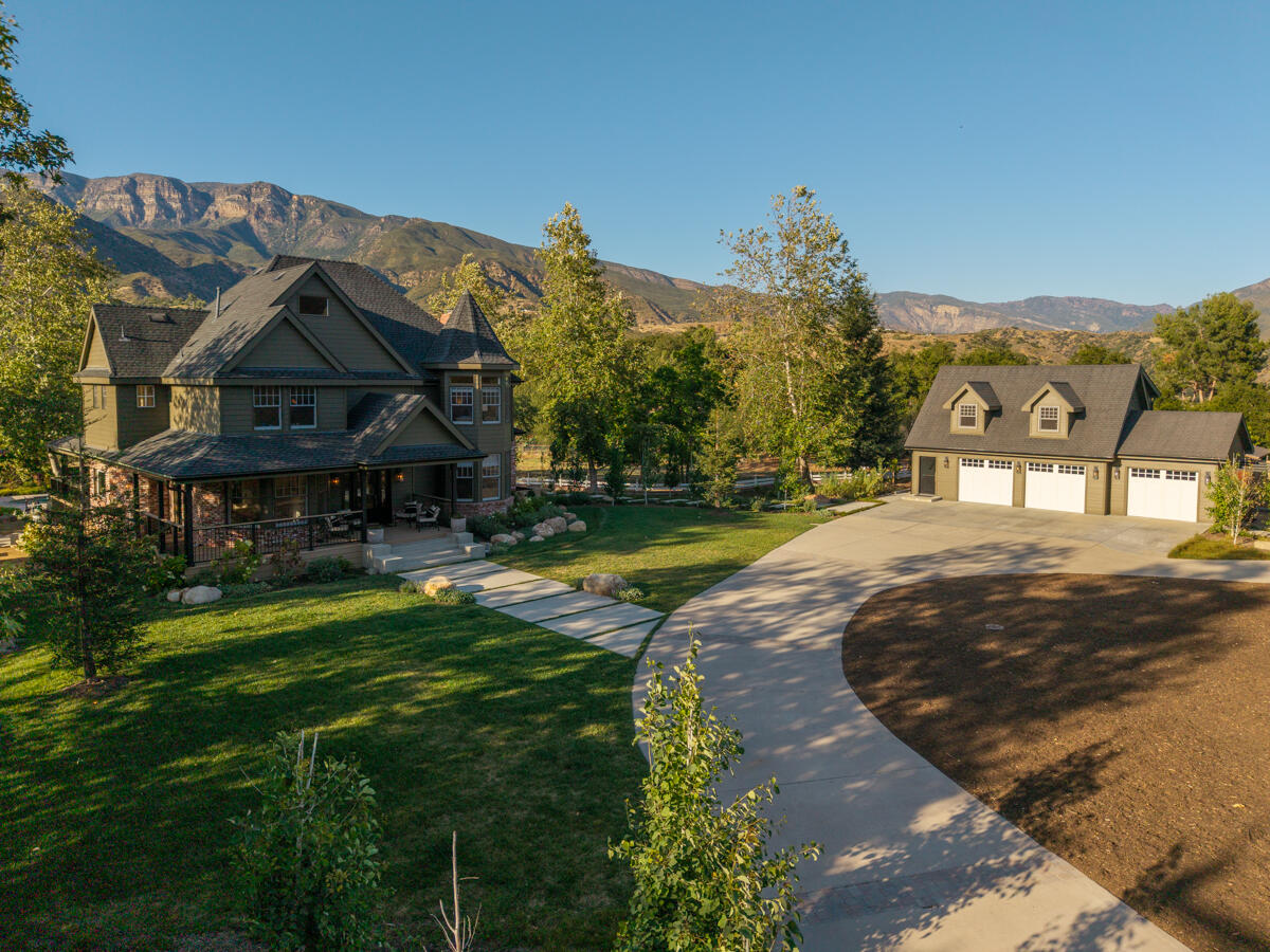 13100 Ojai Road Santa Paula, CA 93060 - Photo 47 of 60 a view of a big house with a big yard and large trees