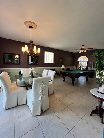 a bathroom with a sink a bathtub and a mirror