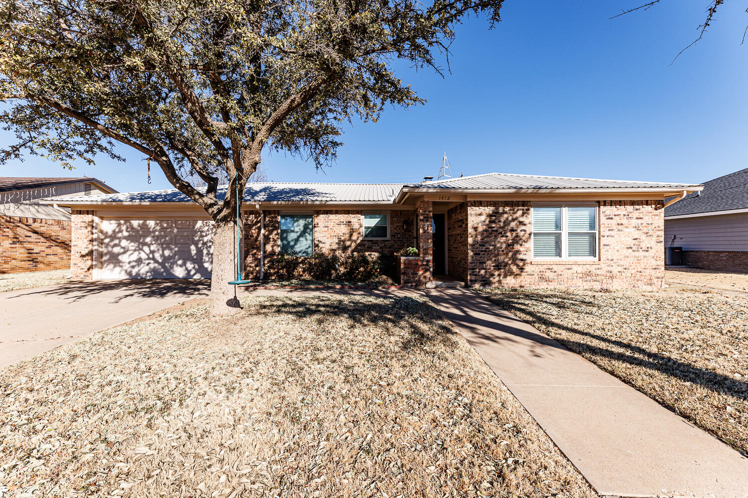 1412 Quaker Street Slaton, TX 79364 - Photo 1 of 42 Front Exterior
