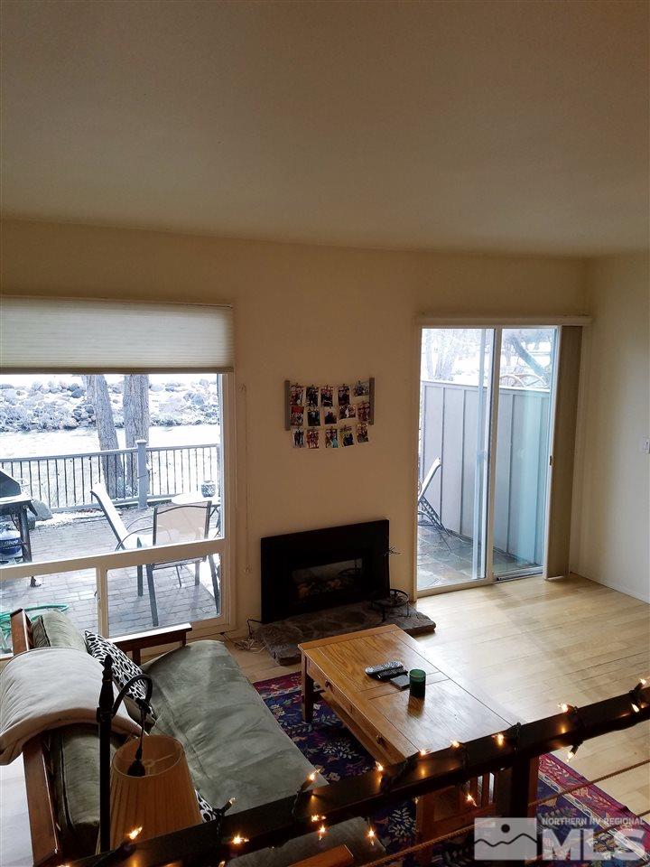 1316 Jones Street Reno, NV 89503 - Photo 6 of 16 a living room with furniture pool table and flat screen tv