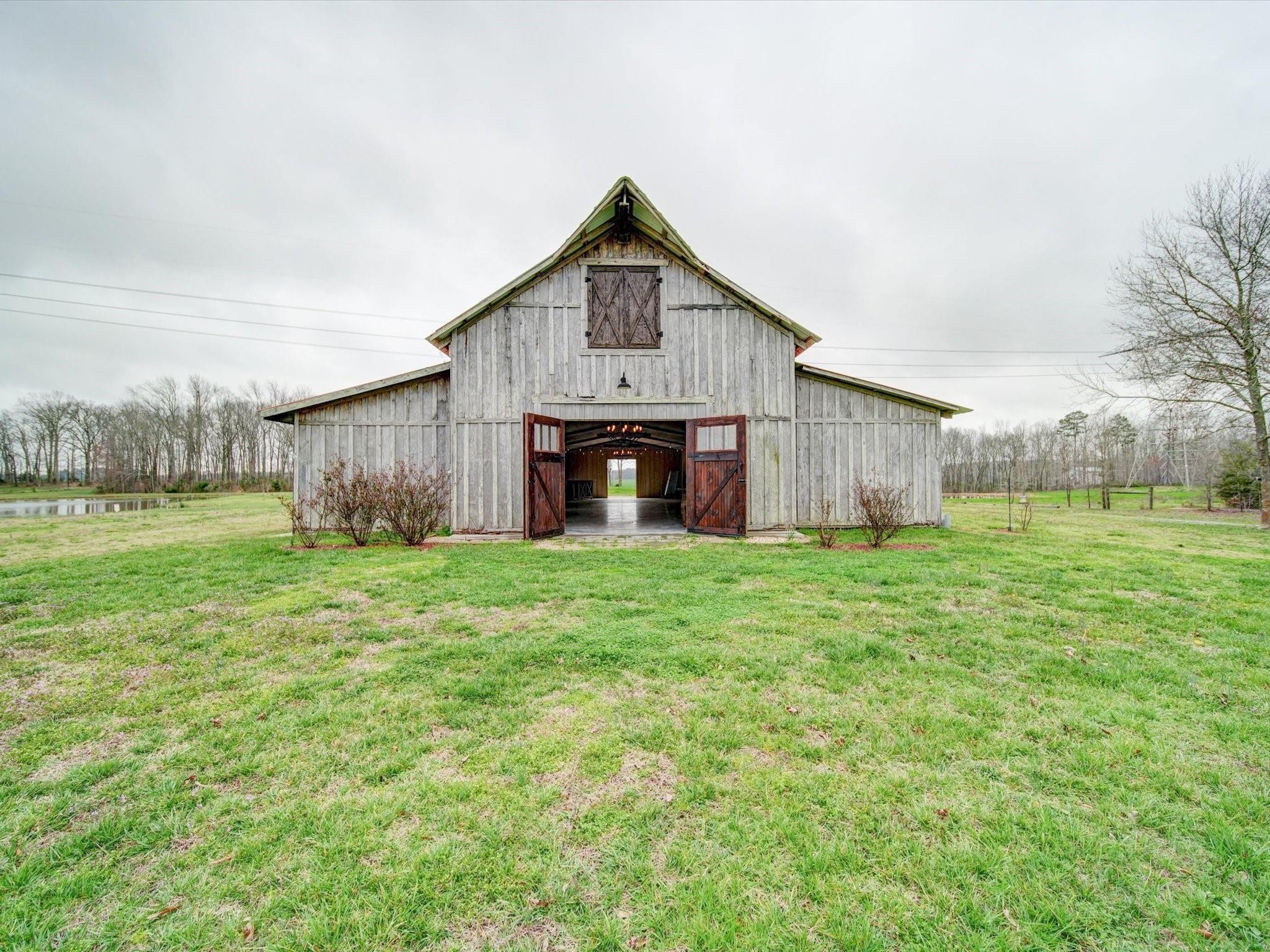 724 Bruce Thomas Road Monroe, NC 28112 - Photo 1 of 47 a front view of house with garden
