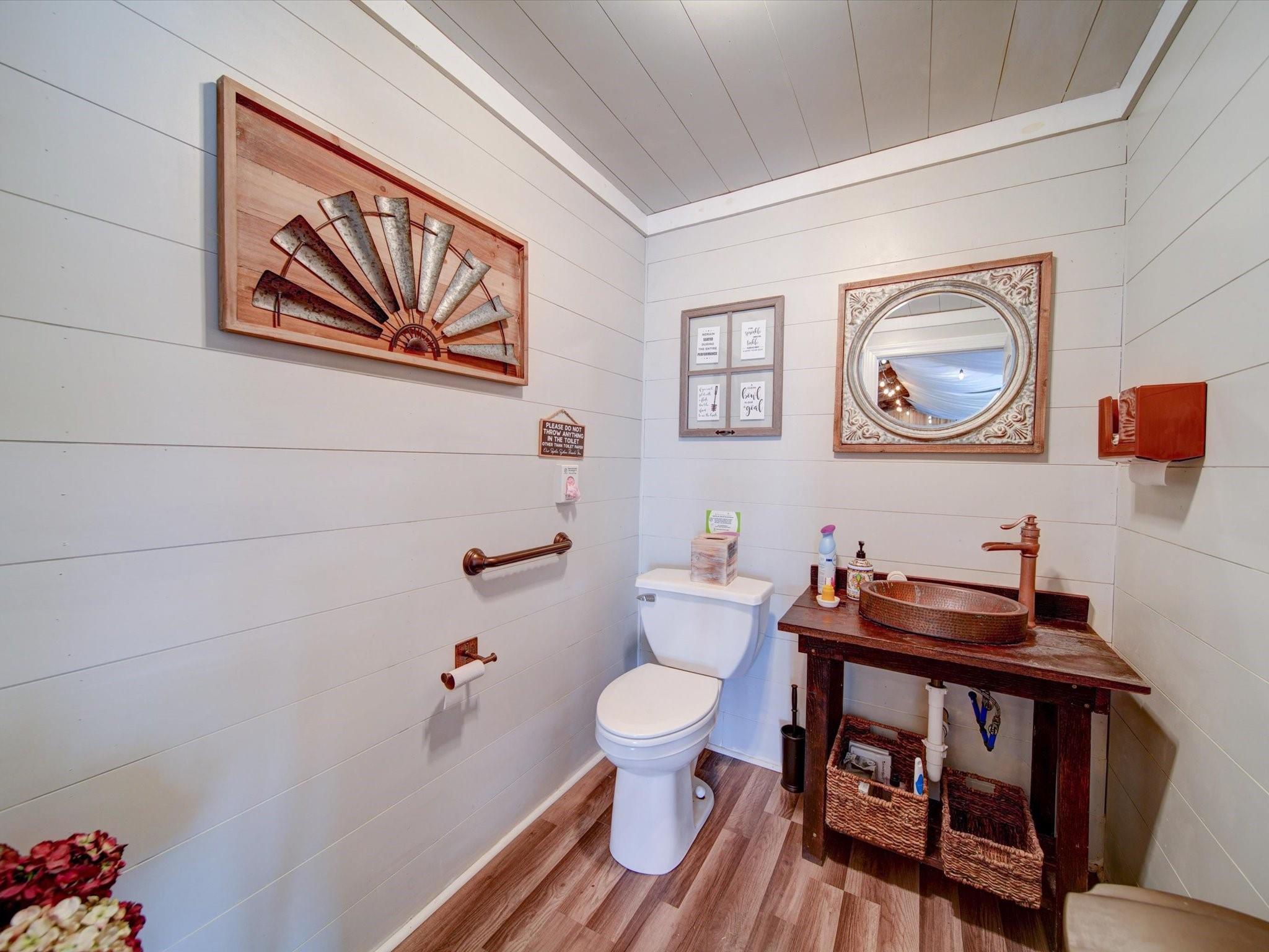 724 Bruce Thomas Road Monroe, NC 28112 - Photo 14 of 47 a bathroom with a toilet a sink and a mirror