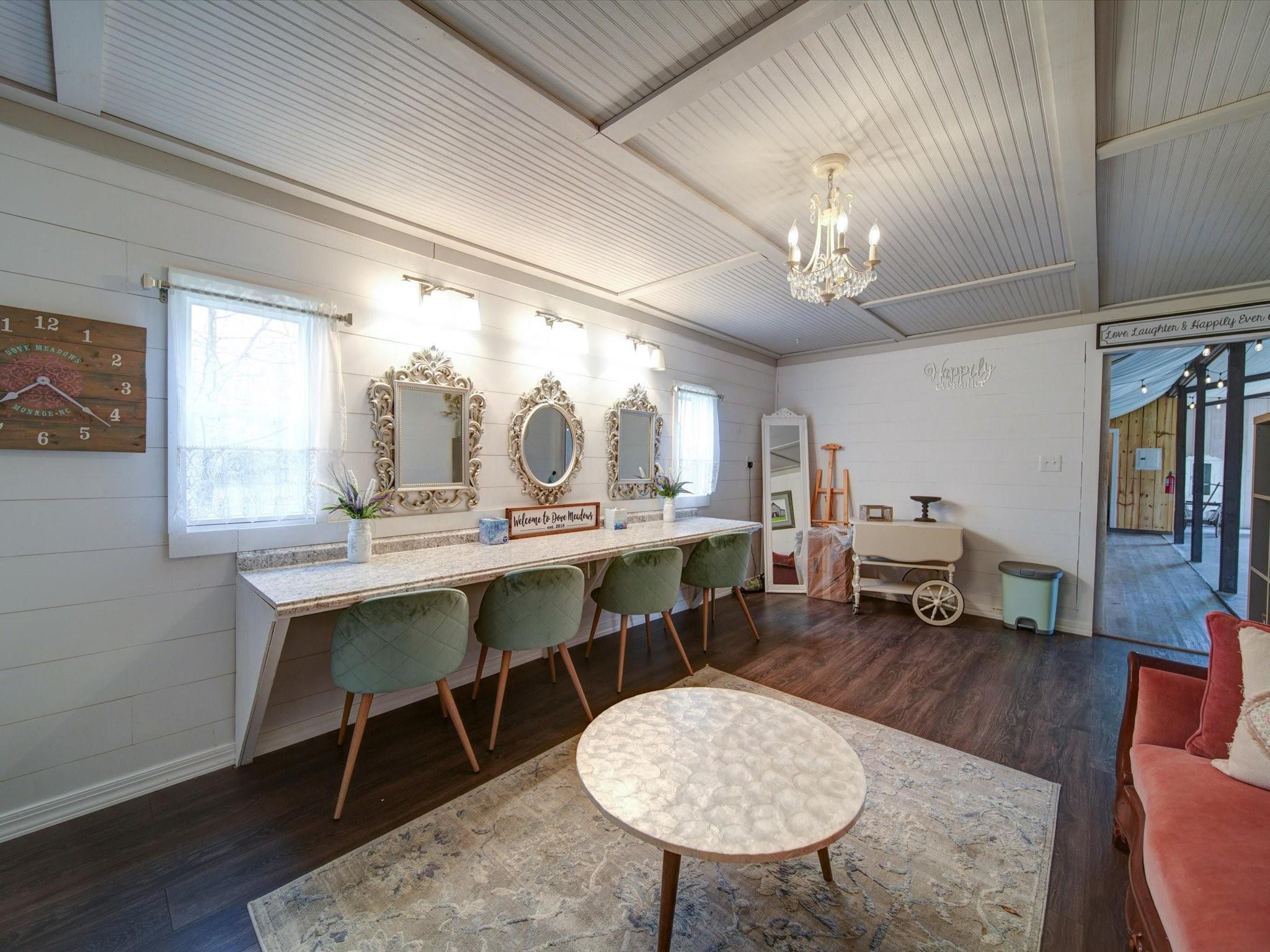 724 Bruce Thomas Road Monroe, NC 28112 - Photo 18 of 47 a view of a a dining room with furniture window and wooden floor