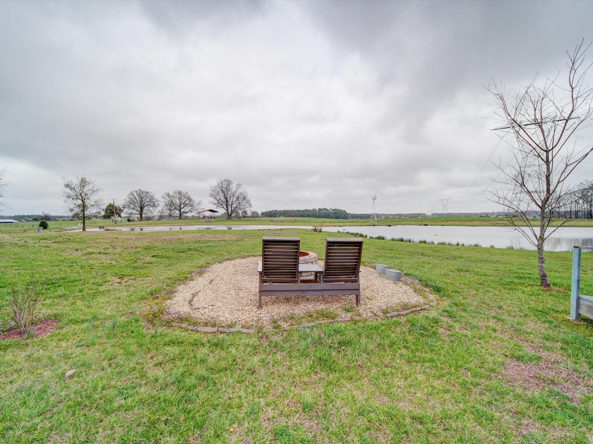 724 Bruce Thomas Road Monroe, NC 28112 - Photo 35 of 47 a view of a swimming pool and a yard
