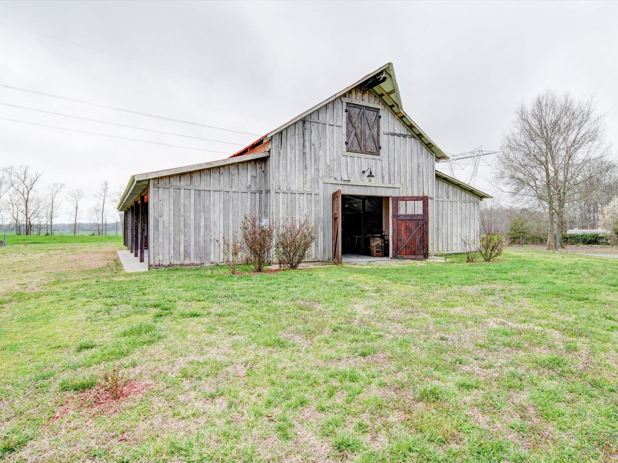 724 Bruce Thomas Road Monroe, NC 28112 - Photo 42 of 47 a view of a house with backyard and garden