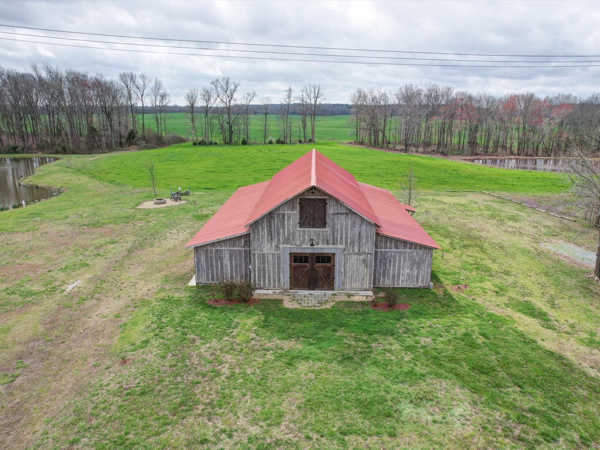 724 Bruce Thomas Road Monroe, NC 28112 - Photo 43 of 47 a view of a house with backyard and garden
