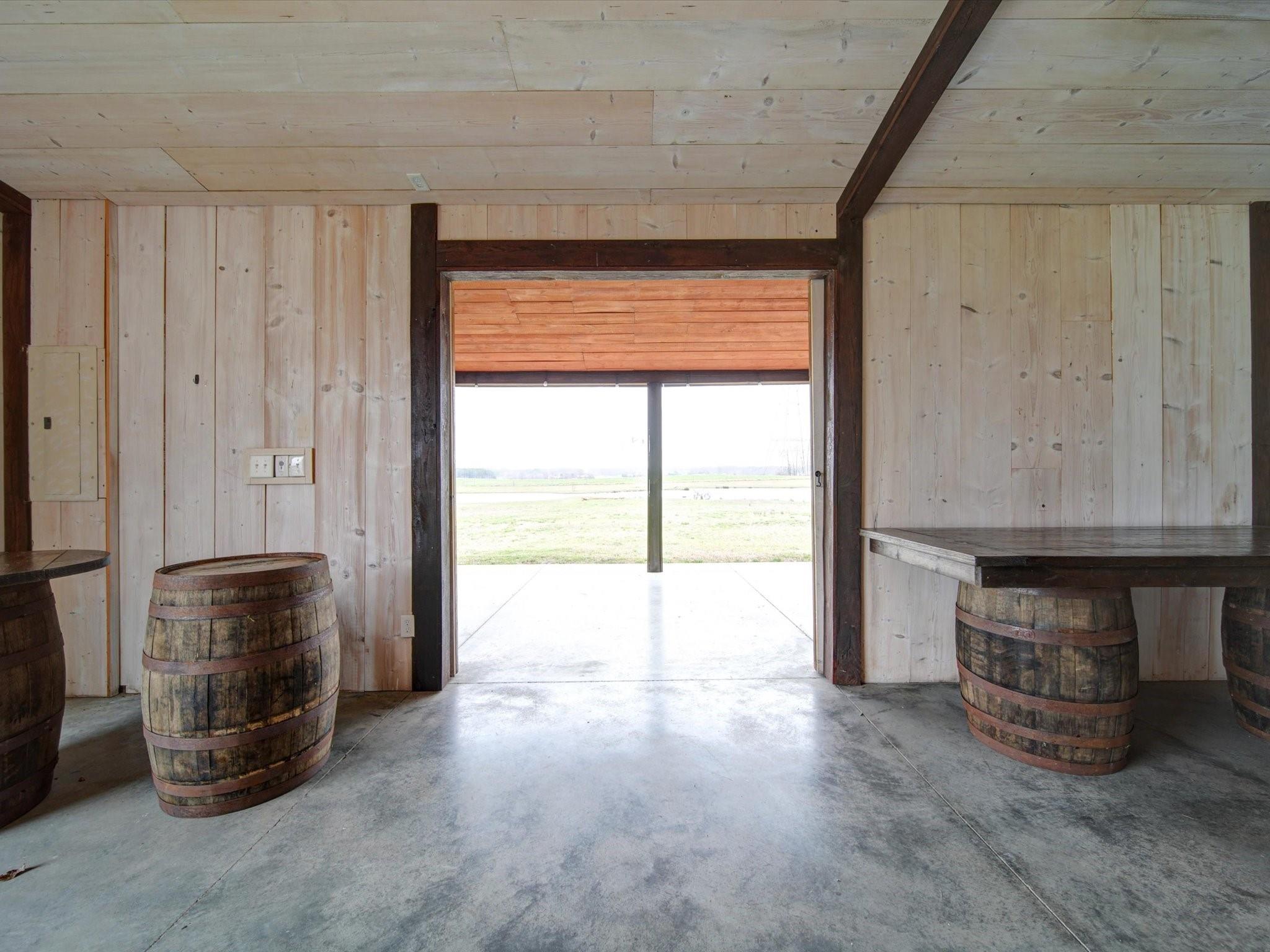 724 Bruce Thomas Road Monroe, NC 28112 - Photo 10 of 47 a view of an empty room with a fireplace and a window