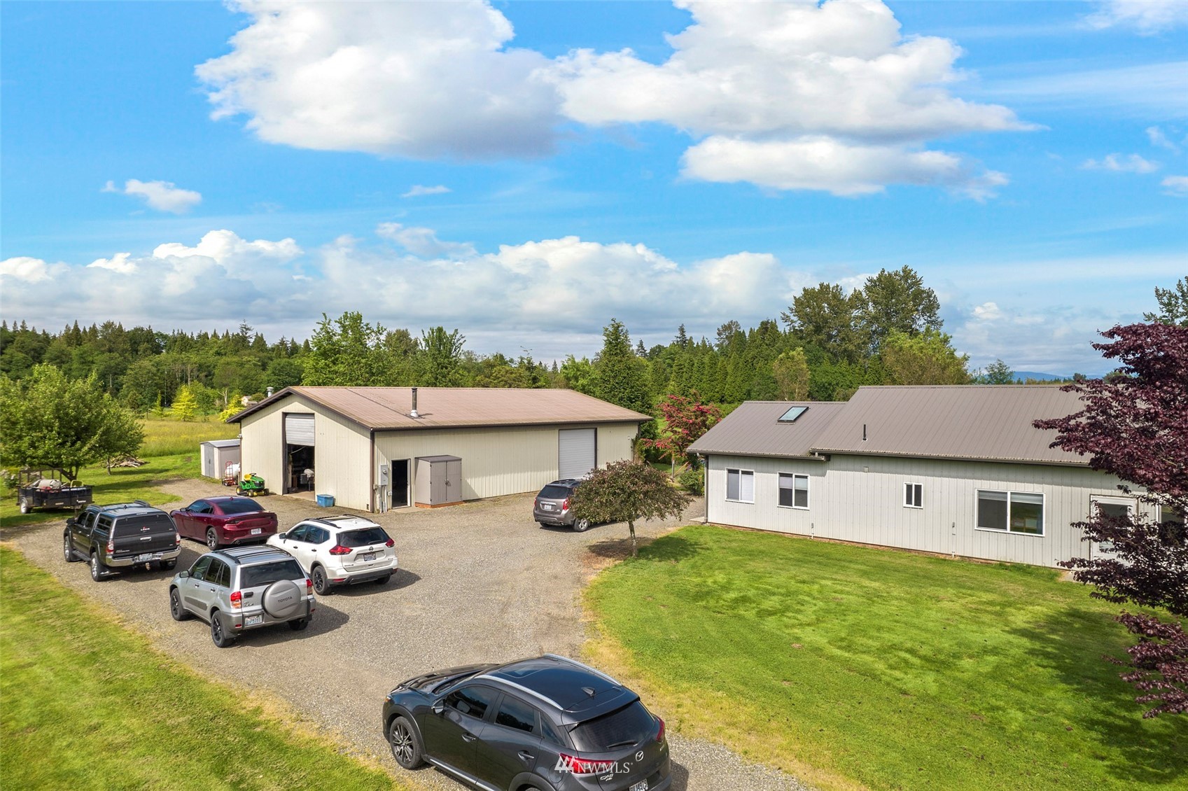 3166 Douglas Road Ferndale, WA 98248 - Photo 25 of 38 a car parked in front of a house with a big yard