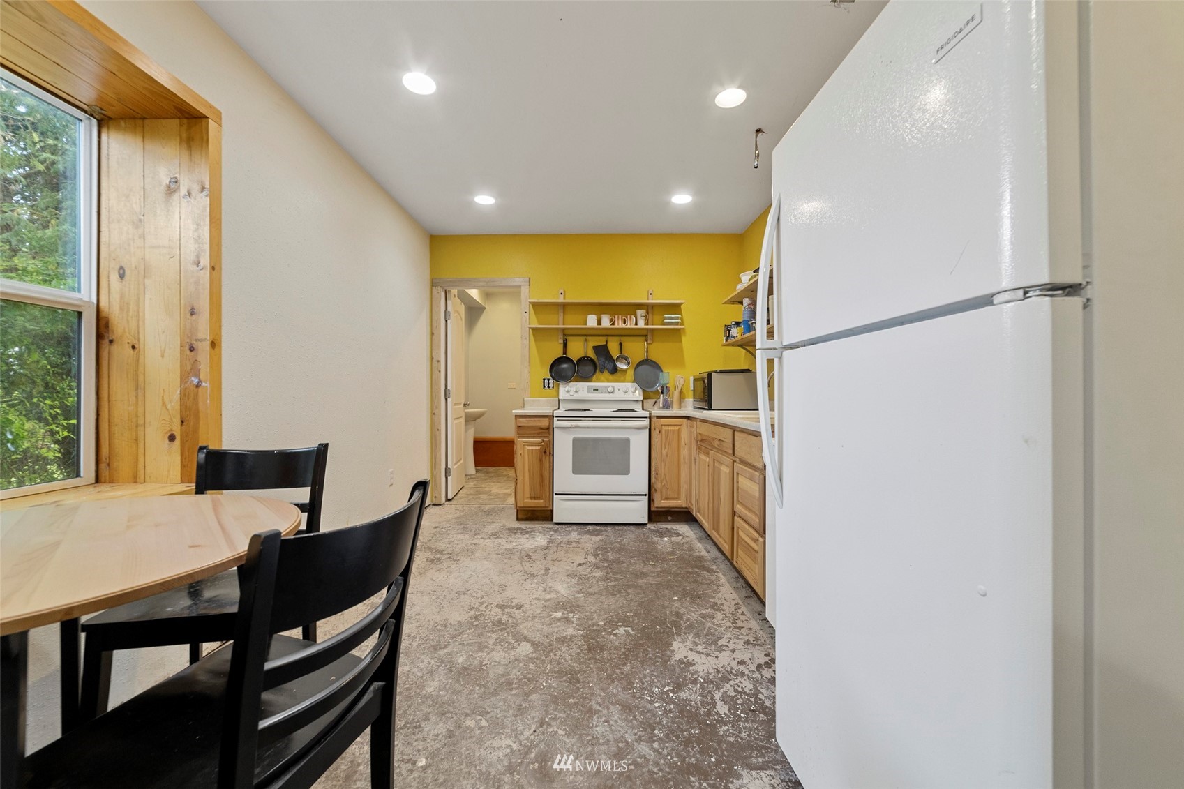 3166 Douglas Road Ferndale, WA 98248 - Photo 33 of 38 a kitchen with a table and chairs