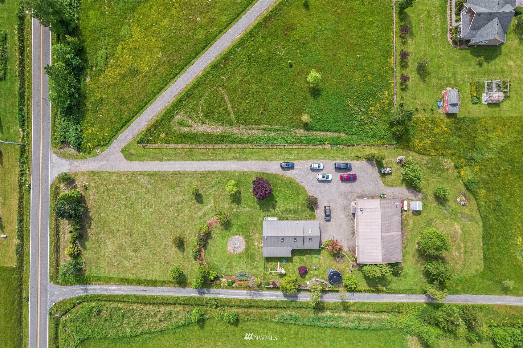 3166 Douglas Road Ferndale, WA 98248 - Photo 38 of 38 an aerial view of a swimming pool with a yard