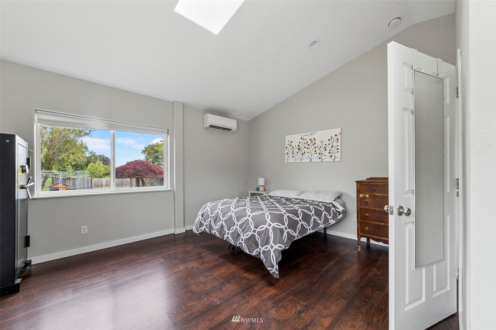 3166 Douglas Road Ferndale, WA 98248 - Photo 6 of 38 a bedroom with a bed and a painting on the wall