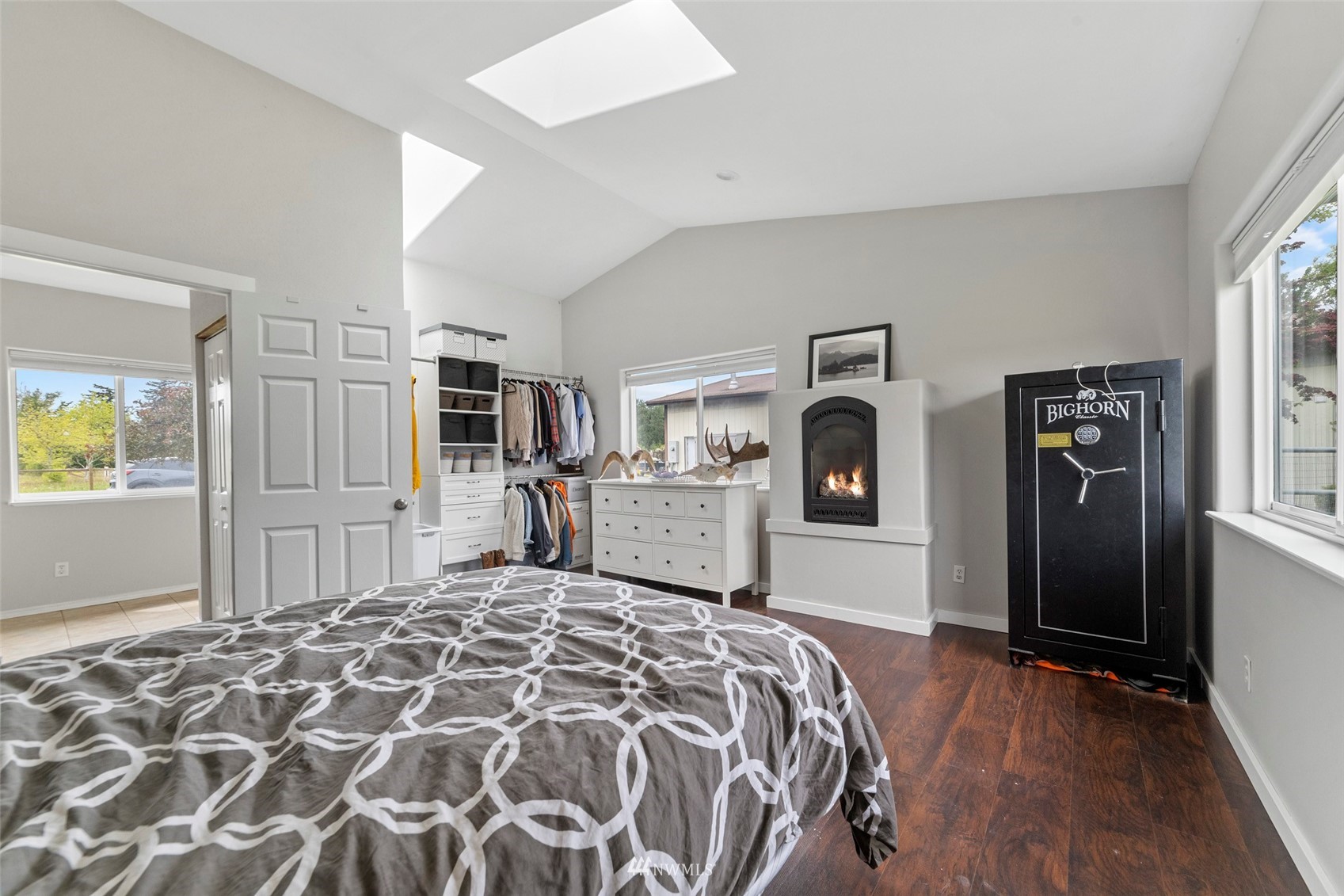 3166 Douglas Road Ferndale, WA 98248 - Photo 7 of 38 a bedroom with a large bed and a window