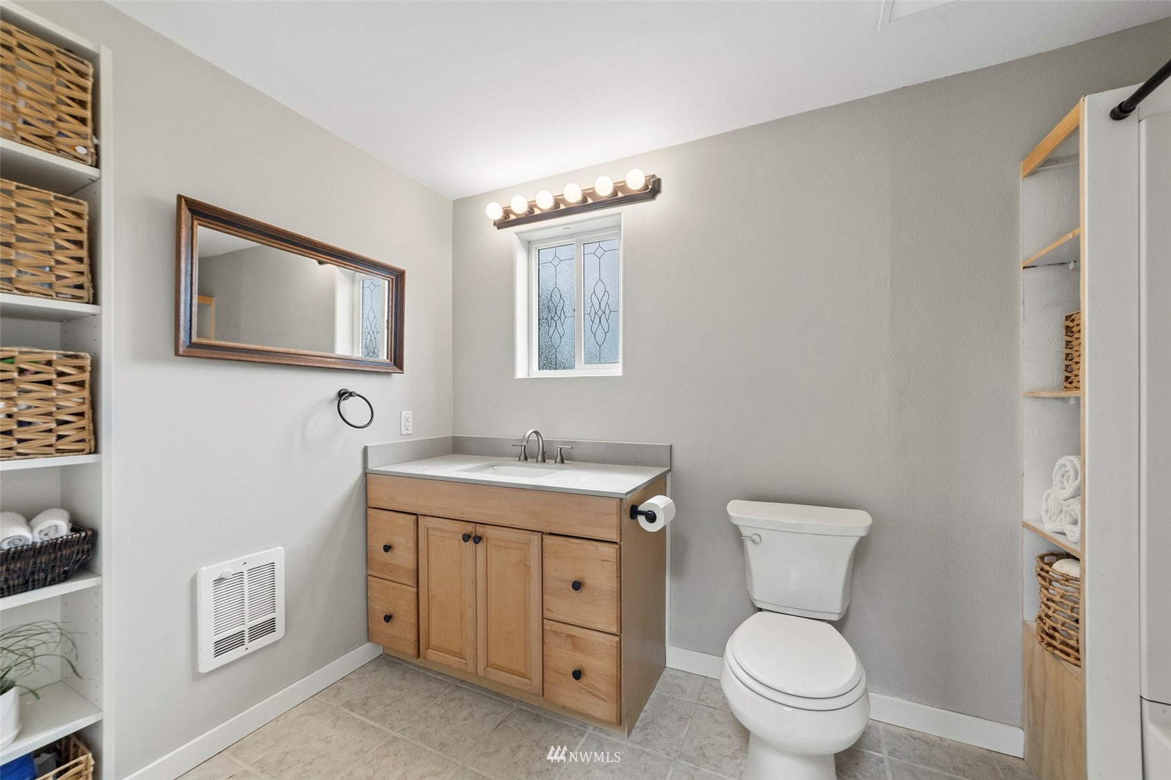 3166 Douglas Road Ferndale, WA 98248 - Photo 9 of 38 a view of bathroom with a toilet sink and a mirror