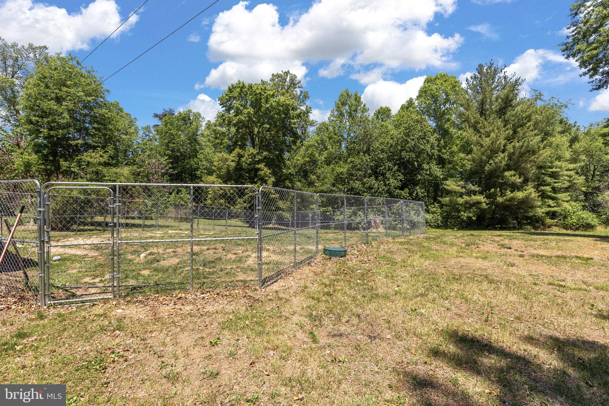 17195 Oakshade Road Orange, VA 22960 - Photo 29 of 31 Spacious fenced area under blue skies.