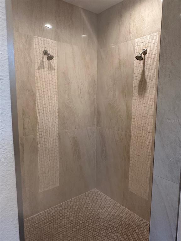 4011 Amber Road Valrico, FL 33594 - Photo 12 of 32 a bathroom with a shower