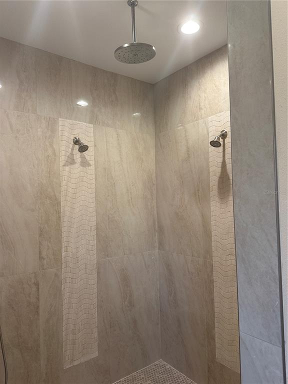 4011 Amber Road Valrico, FL 33594 - Photo 13 of 32 a bathroom with a shower