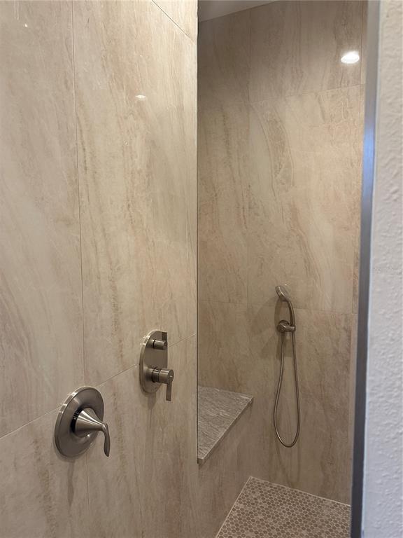 4011 Amber Road Valrico, FL 33594 - Photo 14 of 32 a bathroom with a shower