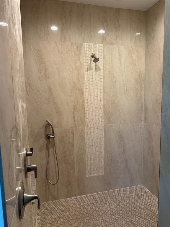4011 Amber Road Valrico, FL 33594 - Photo 16 of 32 a bathroom with a shower