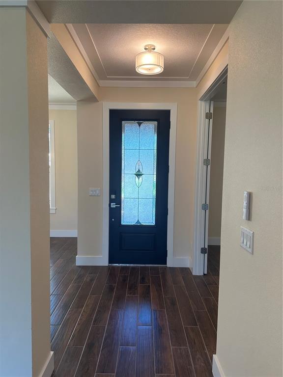 4011 Amber Road Valrico, FL 33594 - Photo 6 of 32 a view of empty room with wooden floor