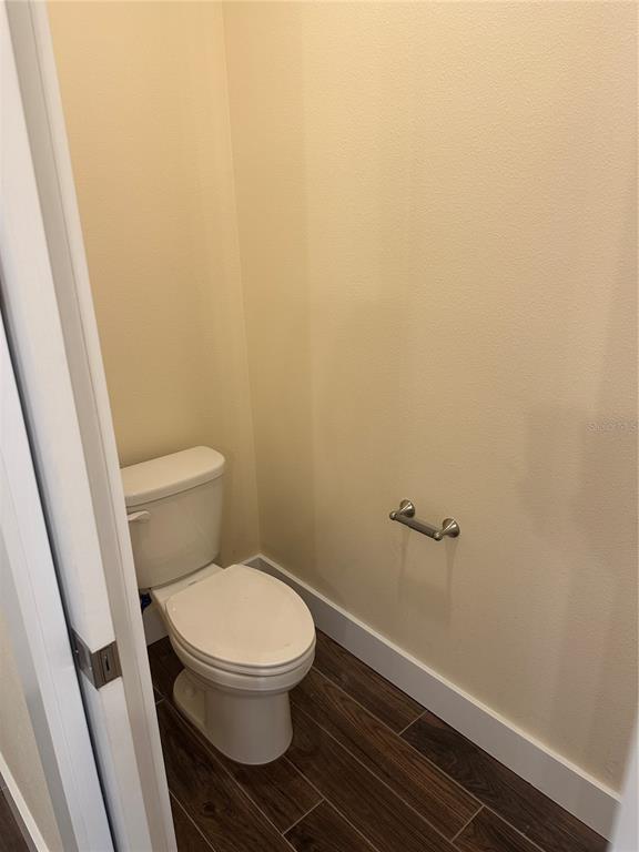 4011 Amber Road Valrico, FL 33594 - Photo 10 of 32 a white toilet sitting next to a shower