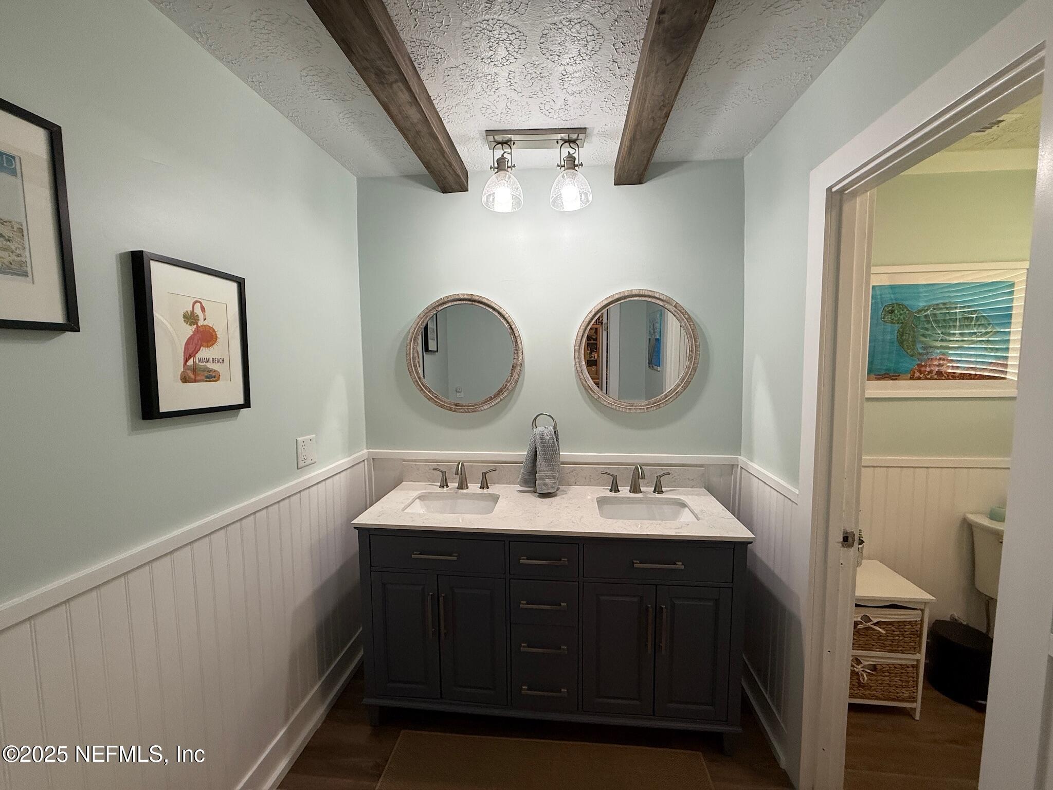 716 Oak Street Neptune Beach, FL 32266 - Photo 13 of 23 a bathroom with a sink and a mirror
